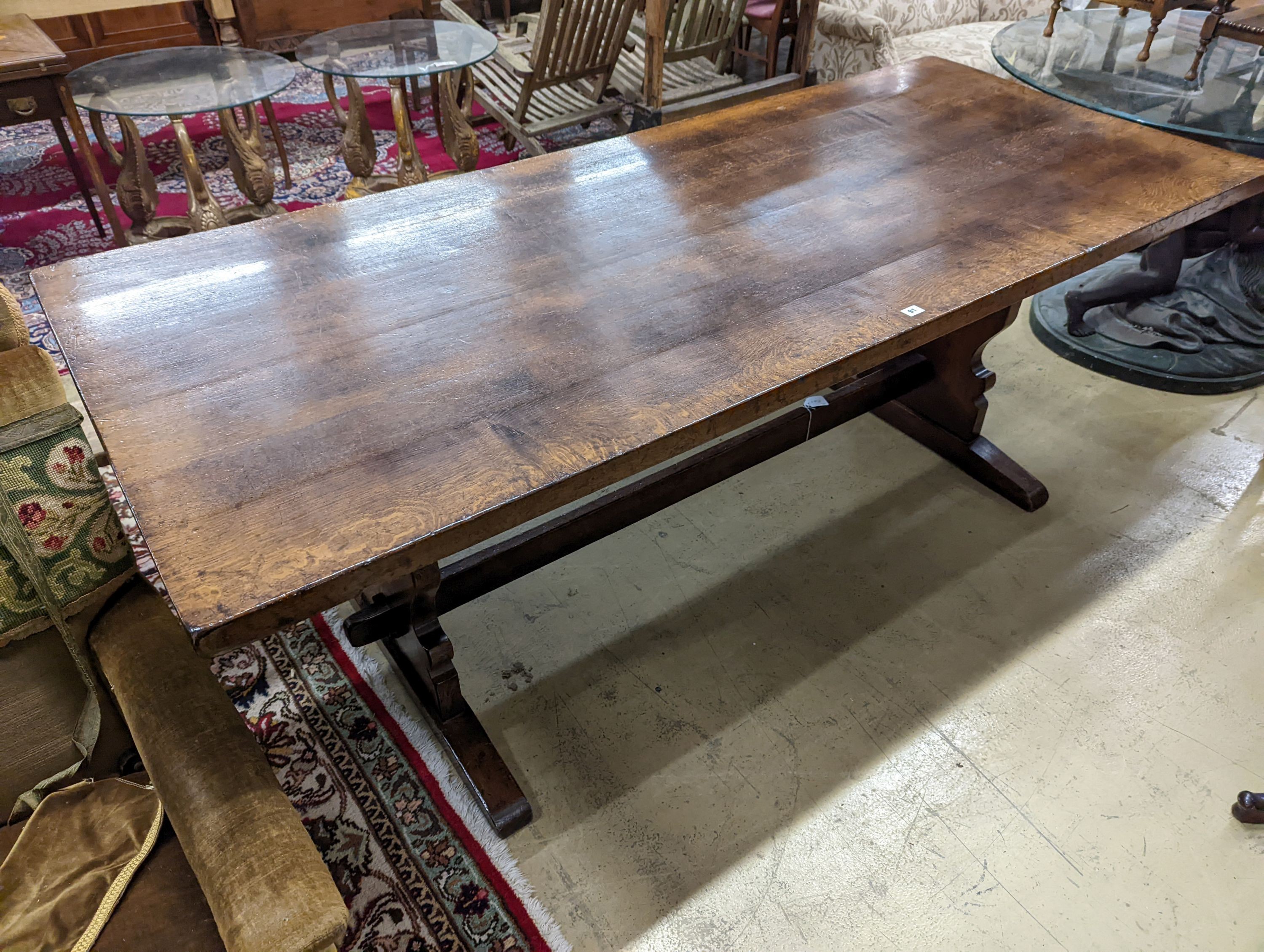 A Liberty oak refectory table, W-214cm, D-91cm, H-76cm.
